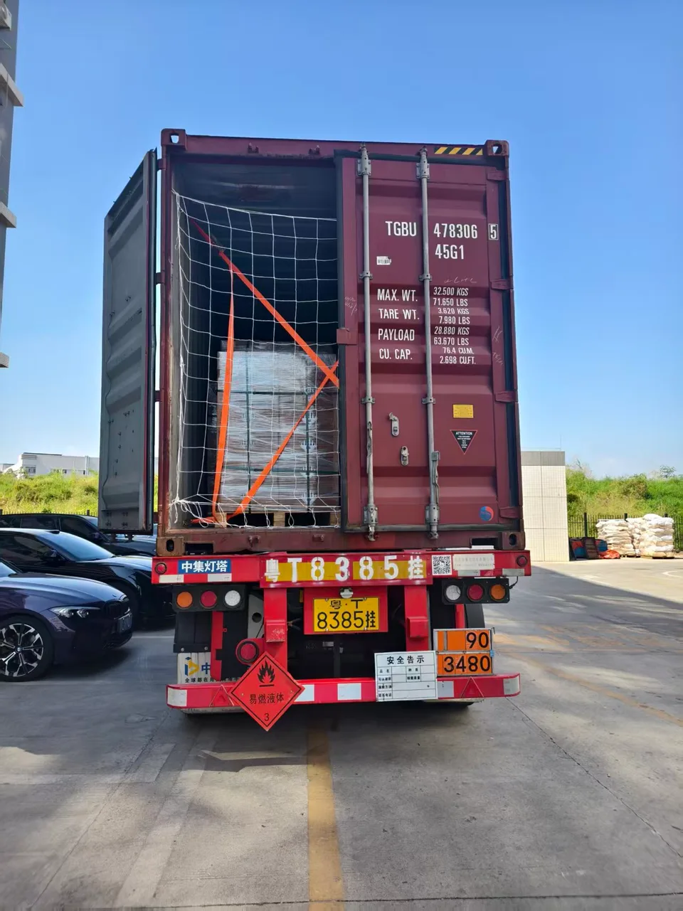 Container door closing stage with secured cargo visible.