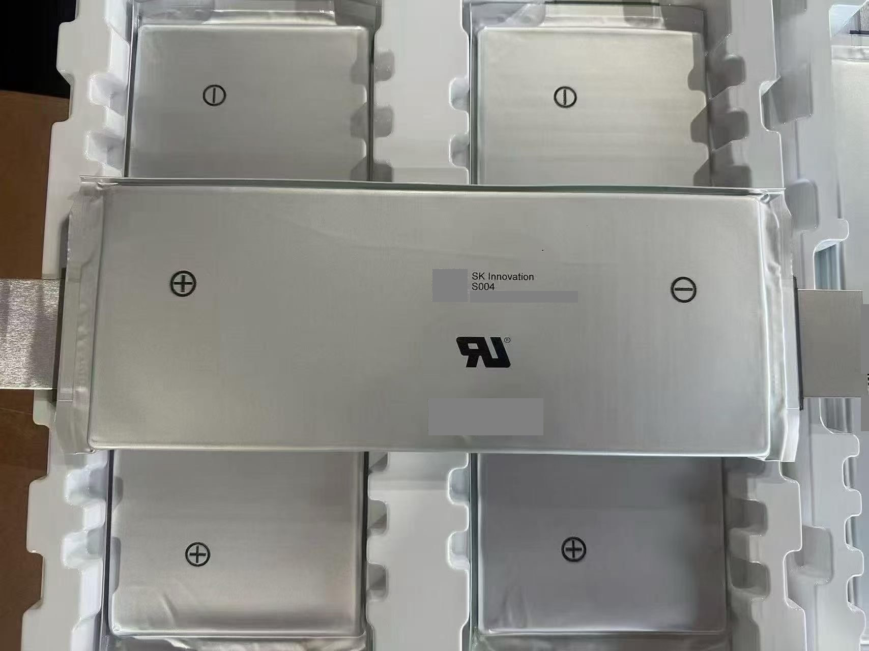 SK 66.5Ah customer-supplied product photograph; tracking marks masked.